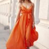 Wieczorowa sukienka kopertowa na ramiączkach pomarańczowa 72962
